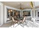 Relaxing outdoor patio with fan and a seating area perfect for entertaining at 2046 Westover Reserve Blvd, Windermere, FL 34786