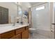 Well-lit bathroom with a vanity, mirror, and a shower-tub combination at 210 Coleton Lane, Deland, FL 32724