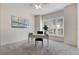 Bright office with white plantation shutters and a desk at 210 Coleton Lane, Deland, FL 32724