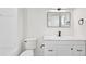 Clean bathroom with modern fixtures, white vanity, and a shower-tub combination at 2301 Finwick Ct, Kissimmee, FL 34743