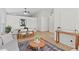 Open-concept living space with dining area and views of the living room at 2301 Finwick Ct, Kissimmee, FL 34743