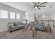 Upstairs living room with two sofas, coffee table, and lots of natural light at 2845 High Pointe St, Clermont, FL 34711