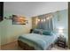 Serene bedroom with soft lighting, neutral tones, and a comfortable bed for a peaceful retreat at 2904 Allison Dr, Orlando, FL 32826
