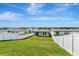 Expansive backyard with a well-maintained lawn and a privacy fence at 29400 Caspian St, Leesburg, FL 34748