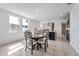Open concept dining area with tile floors, bright windows and plenty of space for entertaining at 29400 Caspian St, Leesburg, FL 34748