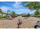 Community playground featuring swings, a slide, and a bark ground at 29400 Caspian St, Leesburg, FL 34748