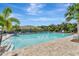 Large community pool featuring plenty of lounge chairs and ample space to relax at 29400 Caspian St, Leesburg, FL 34748