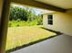 The backyard offers privacy with ample green space and a covered patio at 4326 Sagefield Dr, Harmony, FL 34773