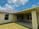 View of the covered patio and backyard, perfect for relaxing and entertaining at 4326 Sagefield Dr, Harmony, FL 34773