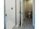 An enclosed shower, separate toilet, and tile floor are all featured in this bathroom at 4326 Sagefield Dr, Harmony, FL 34773