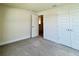 Bedroom features carpeted floors and a closet at 4326 Sagefield Dr, Harmony, FL 34773