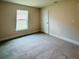 Bedroom with window and closet entrance, and base trim all around at 4326 Sagefield Dr, Harmony, FL 34773