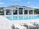 Beautiful community pool with ample seating and a covered area for shade and relaxation at 4326 Sagefield Dr, Harmony, FL 34773