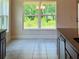 Dining area with large windows offering bright, natural light and scenic views at 4326 Sagefield Dr, Harmony, FL 34773