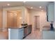 An open kitchen with stainless steel appliances and gray cabinets at 4326 Sagefield Dr, Harmony, FL 34773