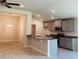 A view of the open-concept living space with the kitchen and dining area at 4326 Sagefield Dr, Harmony, FL 34773