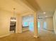 Bright living room featuring neutral paint, carpeted floor and high ceilings at 4326 Sagefield Dr, Harmony, FL 34773