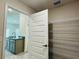 Walk-in pantry with wire shelving for ample storage space at 4326 Sagefield Dr, Harmony, FL 34773