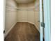 A large, empty walk-in closet includes a carpeted floor and wire shelving at 4326 Sagefield Dr, Harmony, FL 34773