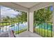 Enjoy serene water views from this private balcony overlooking the pond at 4740 Walden Cir # 28, Orlando, FL 32811