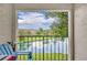 Enjoy picturesque lake views from this charming balcony, perfect for relaxing and unwinding at 4740 Walden Cir # 28, Orlando, FL 32811