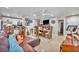 Open concept living space with modern appliances and a decorative ceiling fan, perfect for entertaining at 4740 Walden Cir # 28, Orlando, FL 32811
