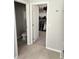 A bathroom that leads to a walk-in closet at 5107 Appenine W Loop, St Cloud, FL 34771