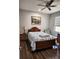 Comfortable bedroom with a ceiling fan and natural light at 5107 Appenine W Loop, St Cloud, FL 34771