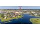 Aerial view of a stunning waterfront home, conveniently located near Hamlin Town Center at 5365 Bowman Dr, Winter Garden, FL 34787