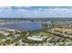 Overhead view of community pool, lake, and surrounding neighborhood at 5365 Bowman Dr, Winter Garden, FL 34787