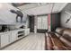Entertainment basement featuring Star Wars decor, sleek flooring, and a comfortable seating area at 5365 Bowman Dr, Winter Garden, FL 34787