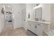 Bathroom featuring double vanity, tub and large shower at 5365 Bowman Dr, Winter Garden, FL 34787