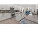 Well-appointed kitchen with stainless steel appliances, granite countertops, and a stylish tile backsplash at 5365 Bowman Dr, Winter Garden, FL 34787