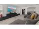 Stylish living room showcasing a modern entertainment center, large screen television, and a cozy gray sectional sofa at 5365 Bowman Dr, Winter Garden, FL 34787