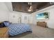 Spacious bedroom featuring a decorative ceiling, plush carpet and lots of natural light at 5365 Bowman Dr, Winter Garden, FL 34787