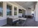 Relaxing patio with stylish outdoor furniture, TV, and string lights for evening enjoyment at 5365 Bowman Dr, Winter Garden, FL 34787