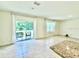 Cozy backyard patio seating area with a clear view of the green yard at 6780 Coral Berry Dr, Mount Dora, FL 32757