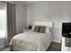 Bedroom with natural light, a cozy rug, and a comfortable bed at 7561 Colbury Ave, Windermere, FL 34786