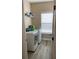 Laundry room with modern appliances and a bright window at 7561 Colbury Ave, Windermere, FL 34786