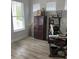 Bright office space with natural light, laminate floors, and a workstation at 7561 Colbury Ave, Windermere, FL 34786