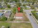 Aerial shot of home located in a residential neighborhood at 7701 Cassino Ave, Orlando, FL 32819