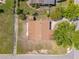 Aerial view of a home showcasing the roof and the surrounding neighborhood at 7701 Cassino Ave, Orlando, FL 32819