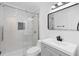 Contemporary bathroom with a tiled shower and modern vanity at 7701 Cassino Ave, Orlando, FL 32819