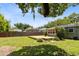 A spacious backyard features a wooden deck, providing an ideal space for outdoor gatherings at 815 W Yale St, Orlando, FL 32804