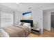 Comfortable bedroom with soft lighting, neutral decor, and ensuite bathroom at 815 W Yale St, Orlando, FL 32804