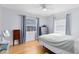 Bright bedroom featuring hardwood floors, neutral walls, and large windows with coverings at 815 W Yale St, Orlando, FL 32804