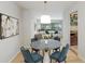 Dining room showcasing a modern light fixture and access to the living room at 815 W Yale St, Orlando, FL 32804