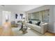Cozy living room with large window and comfortable seating and glass coffee table at 815 W Yale St, Orlando, FL 32804