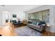 Cozy living room with large window, hardwood floors, and comfortable seating at 815 W Yale St, Orlando, FL 32804