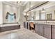 Gorgeous bathroom with a soaking tub, granite countertops, and stylish fixtures at 9729 Lake Hugh Dr, Gotha, FL 34734